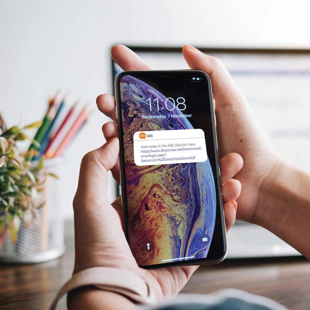 phone in hand with notification to vote in your organization's election